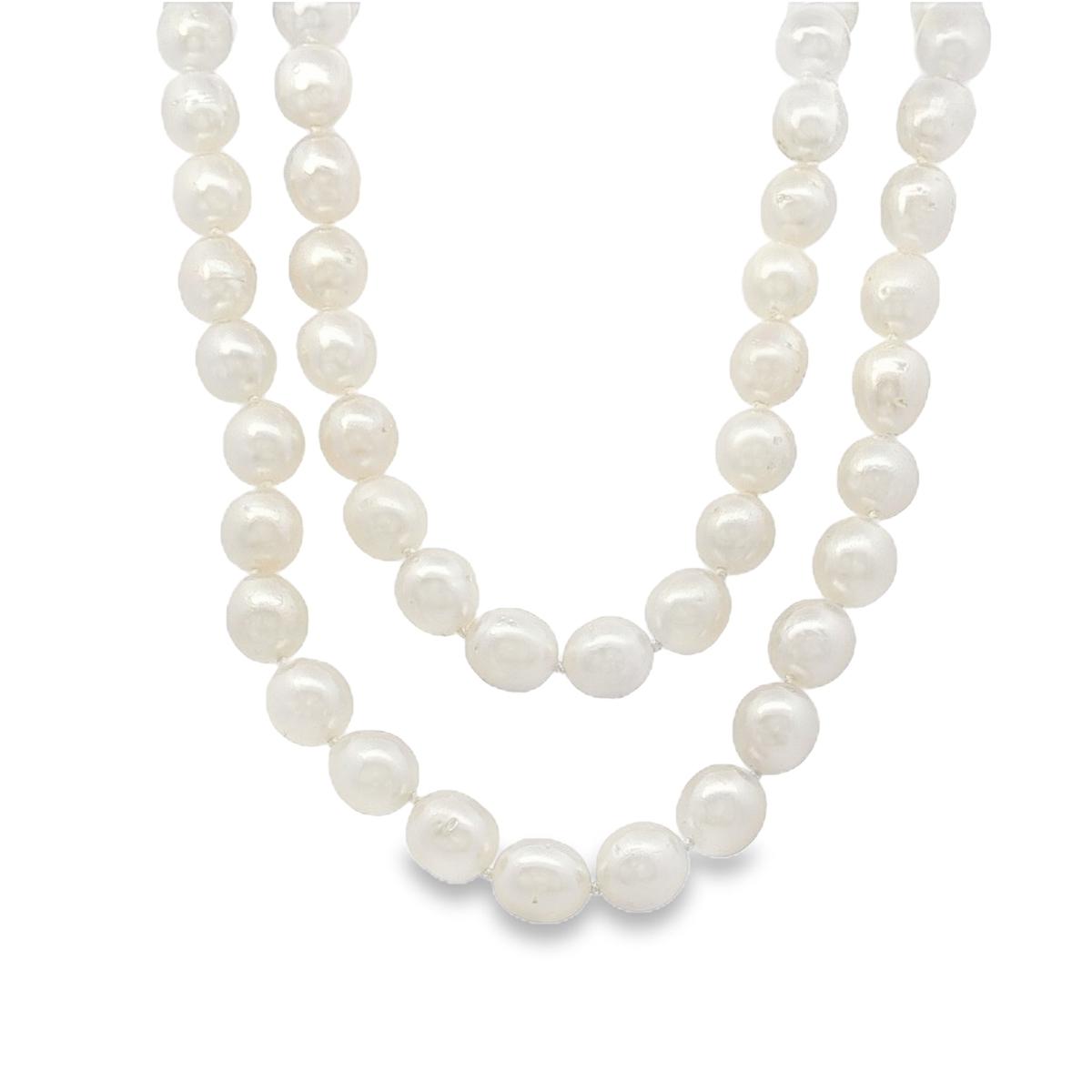 long South Sea pearl strand necklace with silver white oval pearls and sterling silver clasp