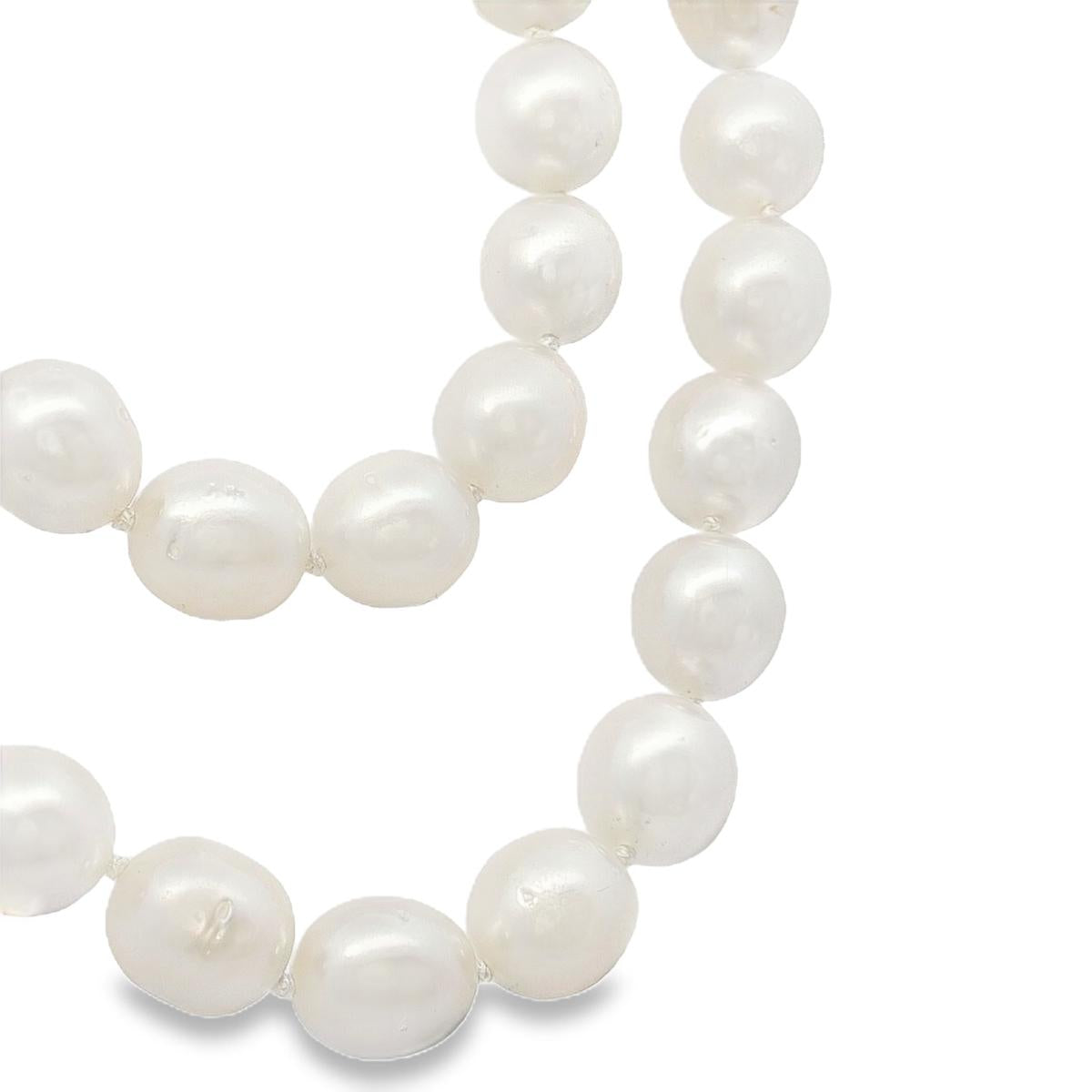 long South Sea pearl strand necklace with silver white oval pearls and sterling silver clasp