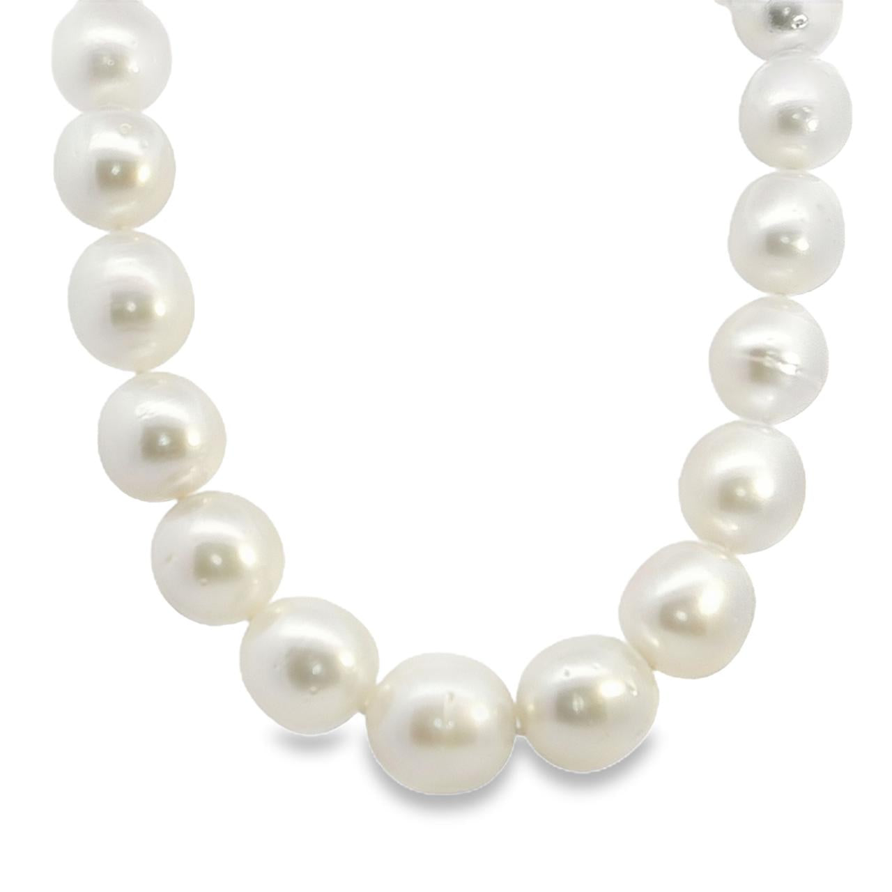 Strand of twenty-nine 12–14mm oval South Sea pearls with an 18ct yellow gold oval matte clasp, individually knotted and graduated in size.