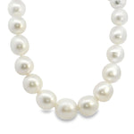 Strand of twenty-nine 12–14mm oval South Sea pearls with an 18ct yellow gold oval matte clasp, individually knotted and graduated in size.