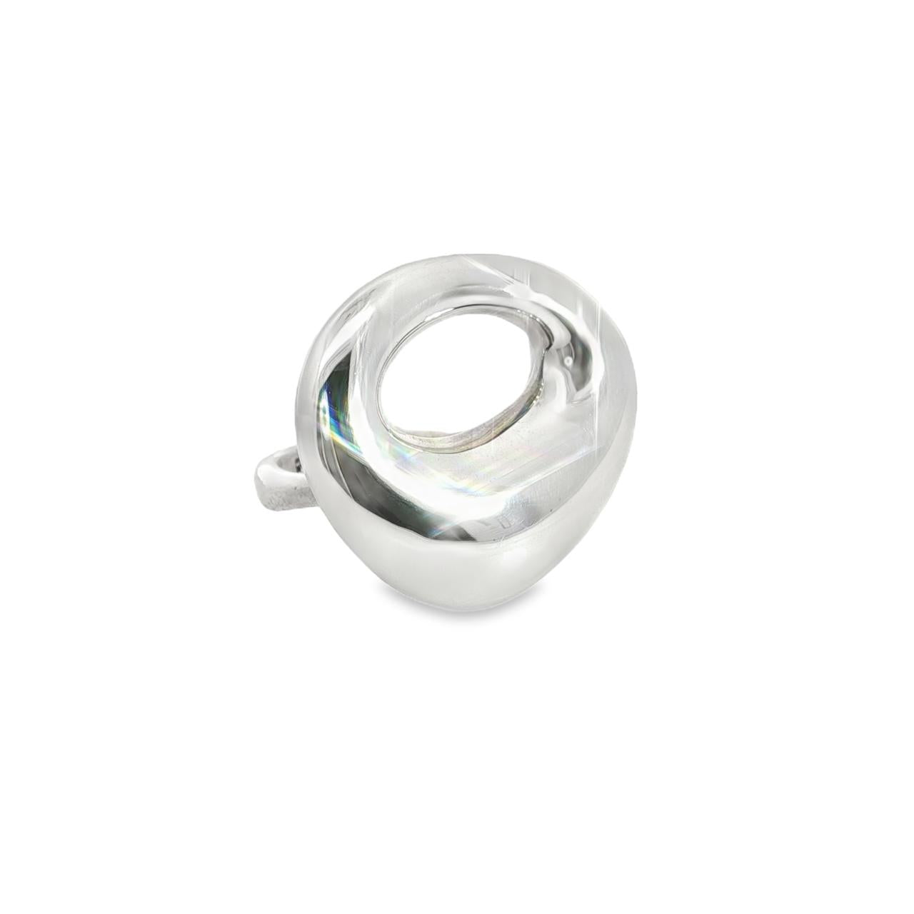 Sterling silver ring with chunky asymmetric open oval-shaped polished top, modern sculptural design.