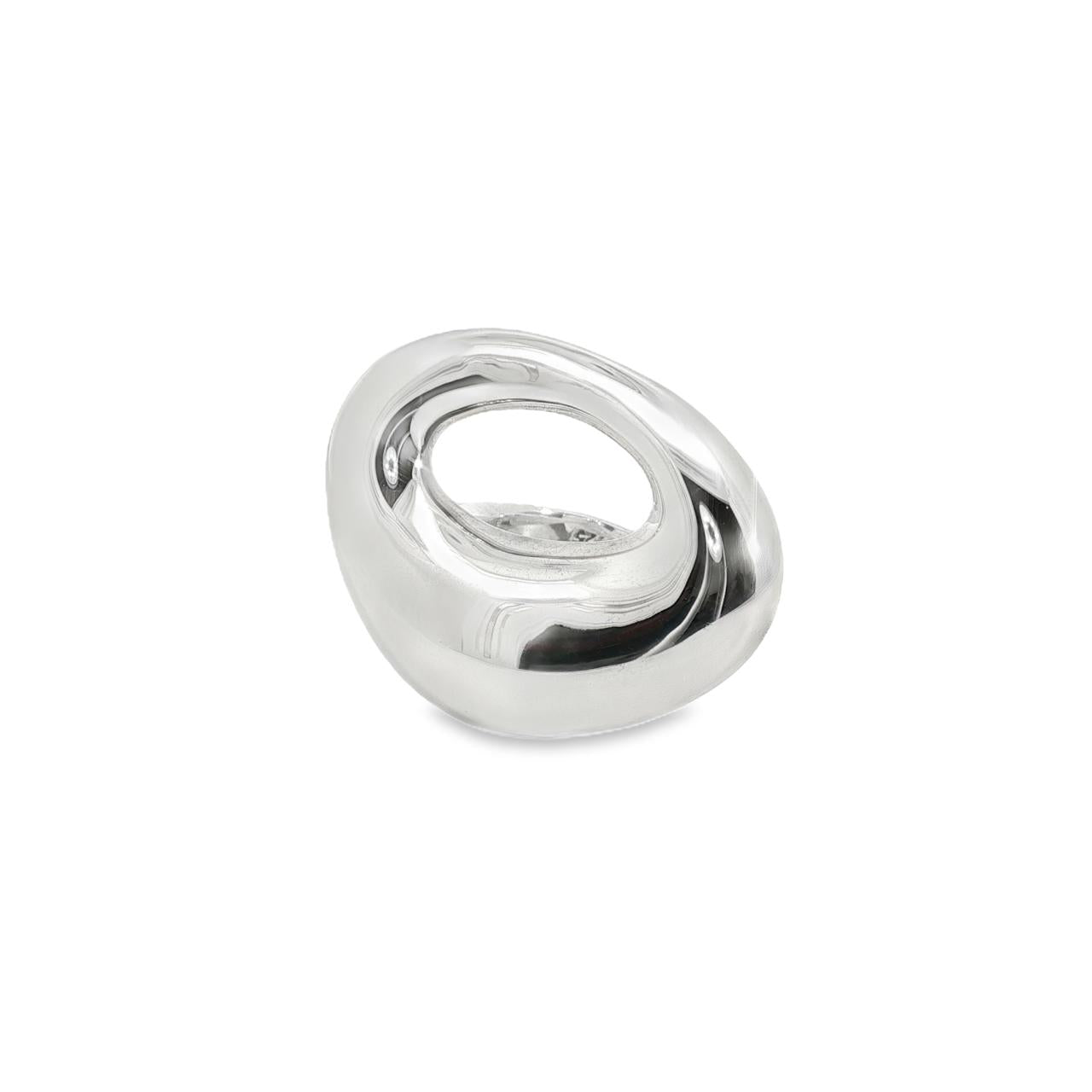 Sterling silver ring with chunky asymmetric open oval-shaped polished top, modern sculptural design.