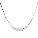 Sterling silver necklet with graduated 4–10mm polished ball links.