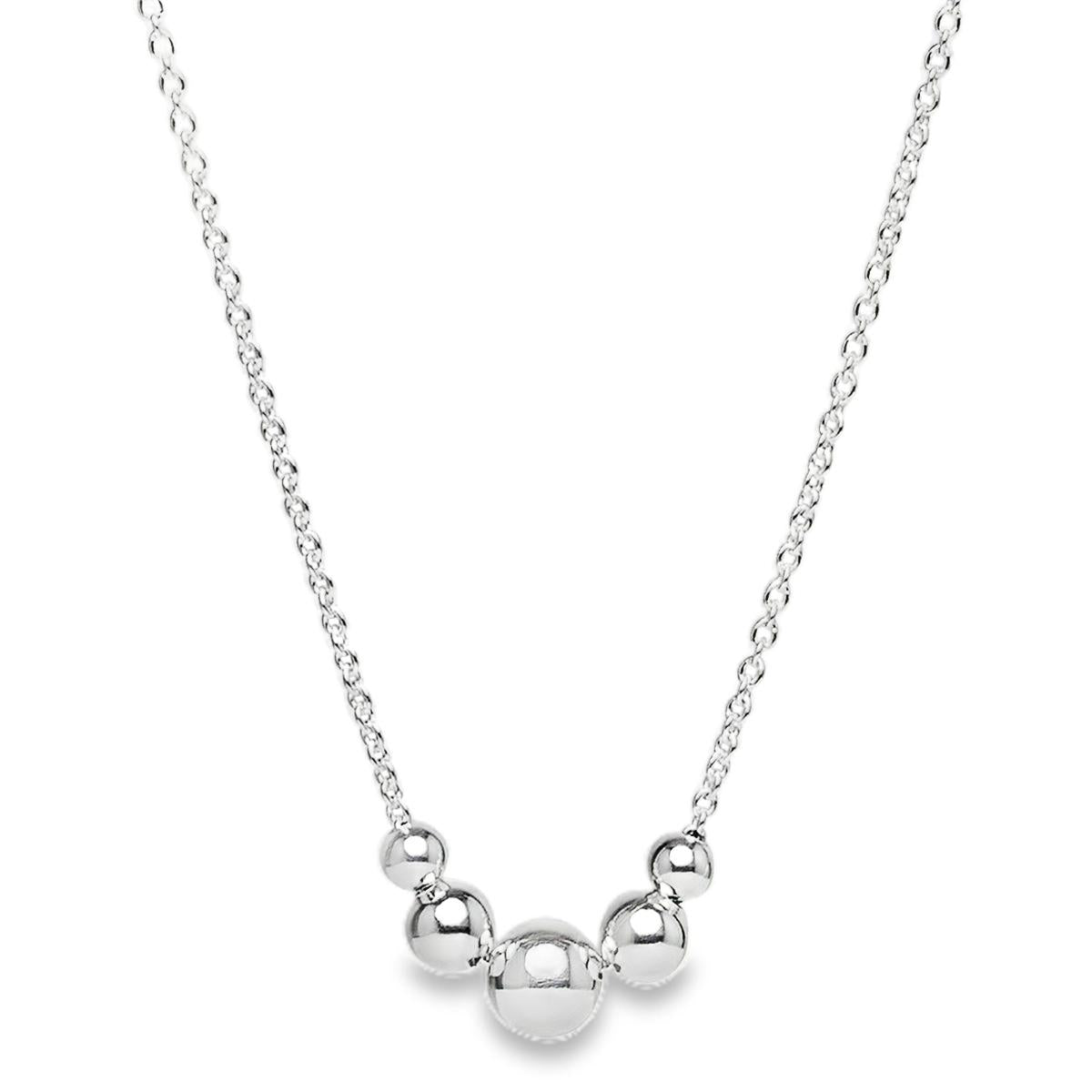Sterling silver necklet with five graduated round beads on a fine trace link chain.