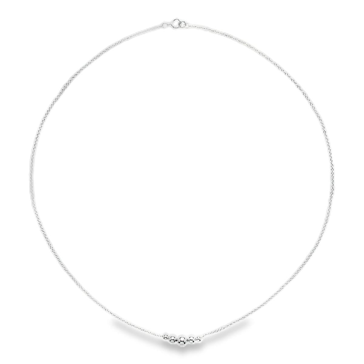 Sterling silver necklet with five graduated round beads on a fine trace link chain.