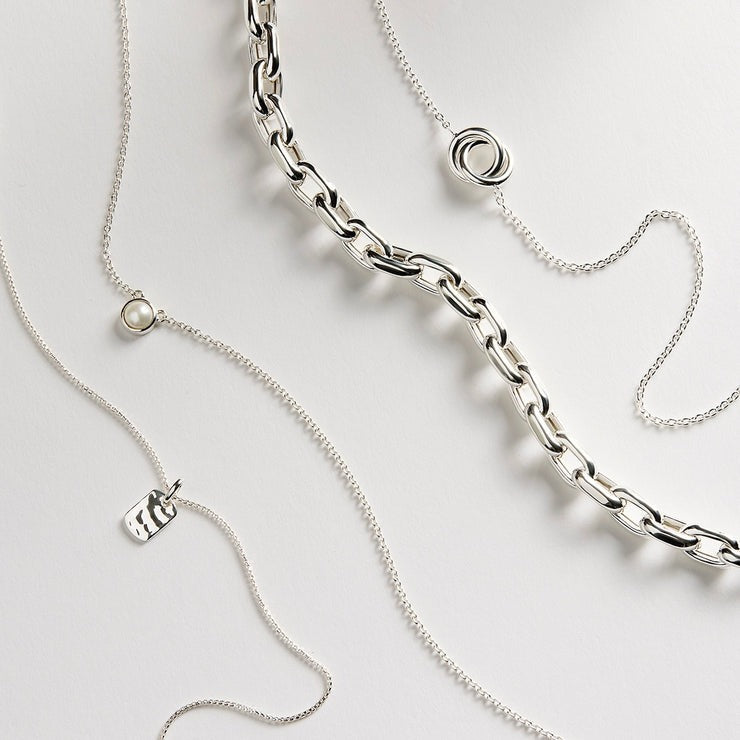Sterling silver trace link necklet with two interlocking rings and extender