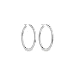 Sterling silver oval hoop earrings with elongated oval shape.