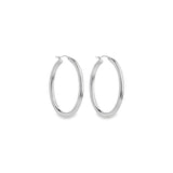 Sterling silver oval hoop earrings with elongated oval shape.