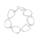 Sterling silver bracelet with open ovoid-shaped curved freeform links and lobster clasp, polished sculptural design.