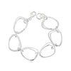 Sterling silver bracelet with open ovoid-shaped curved freeform links and lobster clasp, polished sculptural design.