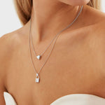sterling silver puff heart necklace with small heart pendant on fine trace chain