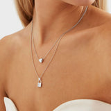 sterling silver puff heart necklace with small heart pendant on fine trace chain