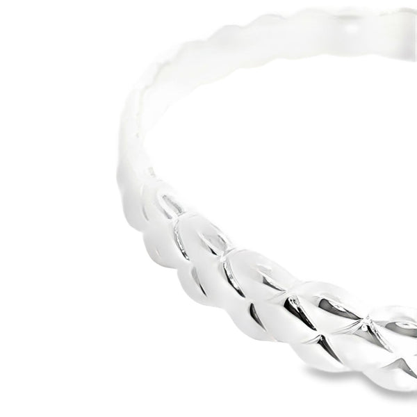 Sterling silver solid bangle featuring a puff quilted pattern with scalloped edges, polished finish, 8mm wide, 66mm internal diameter.