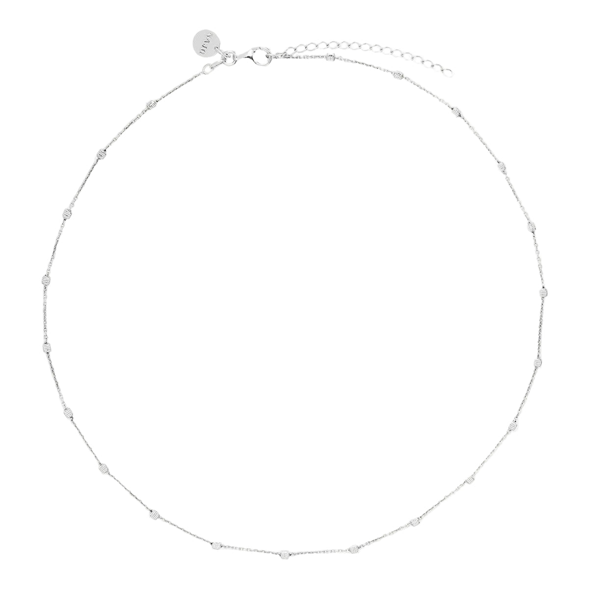 Sterling silver station necklet with textured cube details on a fine trace chain.