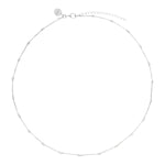 Sterling silver station necklet with textured cube details on a fine trace chain.