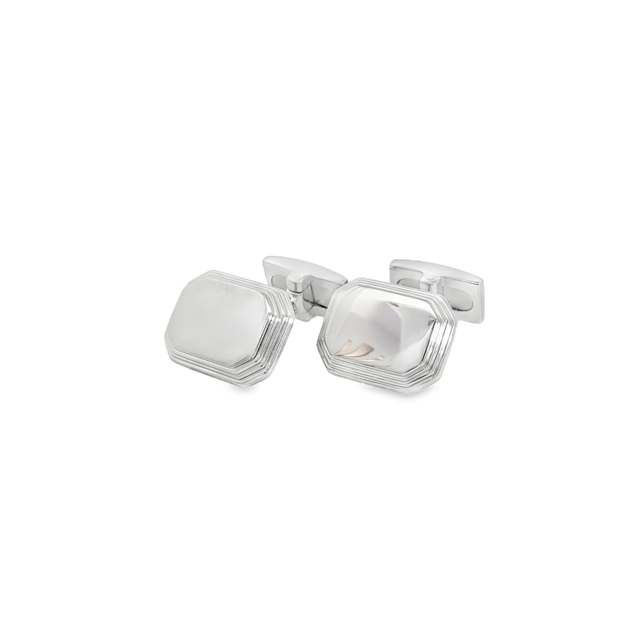 Sterling silver tiered octagonal cufflinks with polished finish.