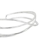 Sterling silver cuff bangle with open triple-strand curved crossover design, polished finish, 22mm wide, 60mm inner measurement.