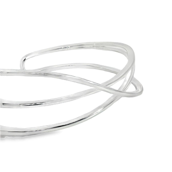 Sterling silver cuff bangle with open triple-strand curved crossover design, polished finish, 22mm wide, 60mm inner measurement.