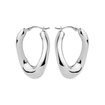 Sterling silver wavy graduated oval hoop earrings with sculptural polished finish.