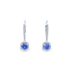 18ct white gold tanzanite and diamond cluster earrings featuring round-cut tanzanites with cushion-shaped diamond halos and articulated drops.