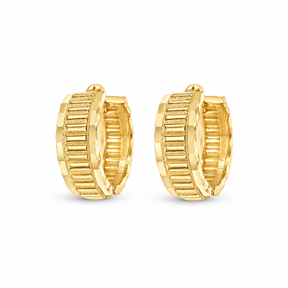 9ct yellow gold textured huggie earrings featuring a line-engraved central pattern, polished facetted edges and hinged design.