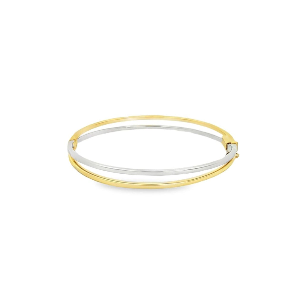 9ct yellow and white gold two tone hinged oval bangle featuring a split design, 60 x 54mm inside dimensions.