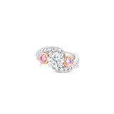 18ct white and rose gold ring featuring a round white diamond centre, two Argyle pink diamond side stones, and bead-set diamond shoulders in a loop design.