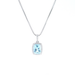 18ct white gold cushion cut aquamarine pendant with diamond halo.