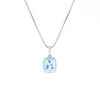 18ct white gold cushion cut aquamarine pendant with diamond halo.
