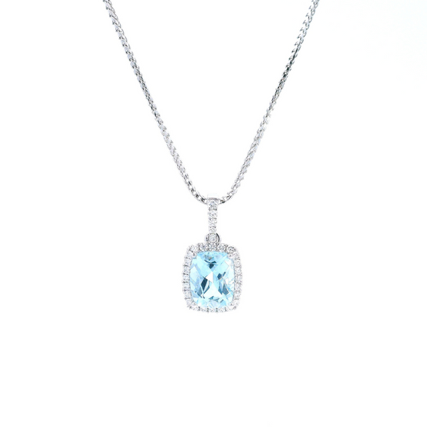 18ct white gold cushion cut aquamarine pendant with diamond halo.