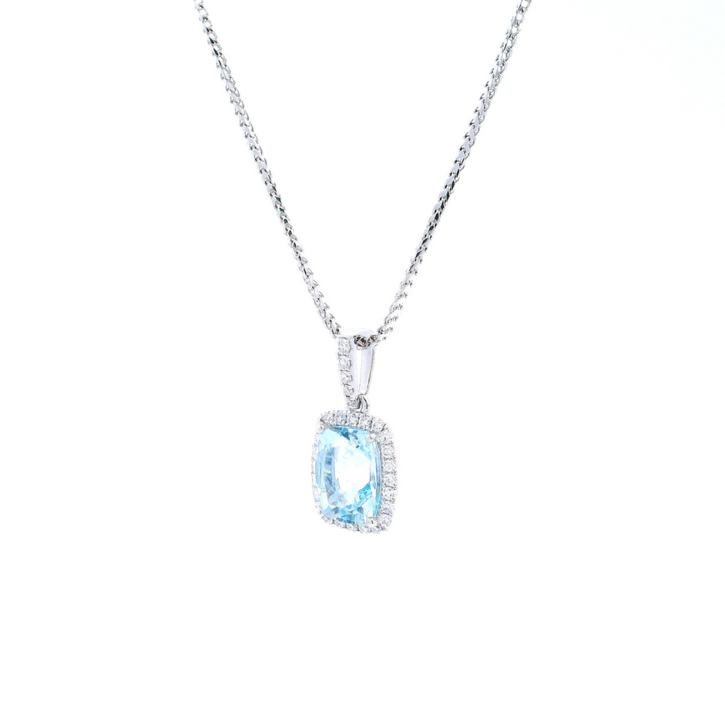 18ct white gold cushion cut aquamarine pendant with diamond halo.