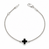 9ct white gold trace link bracelet with small black clover centre.