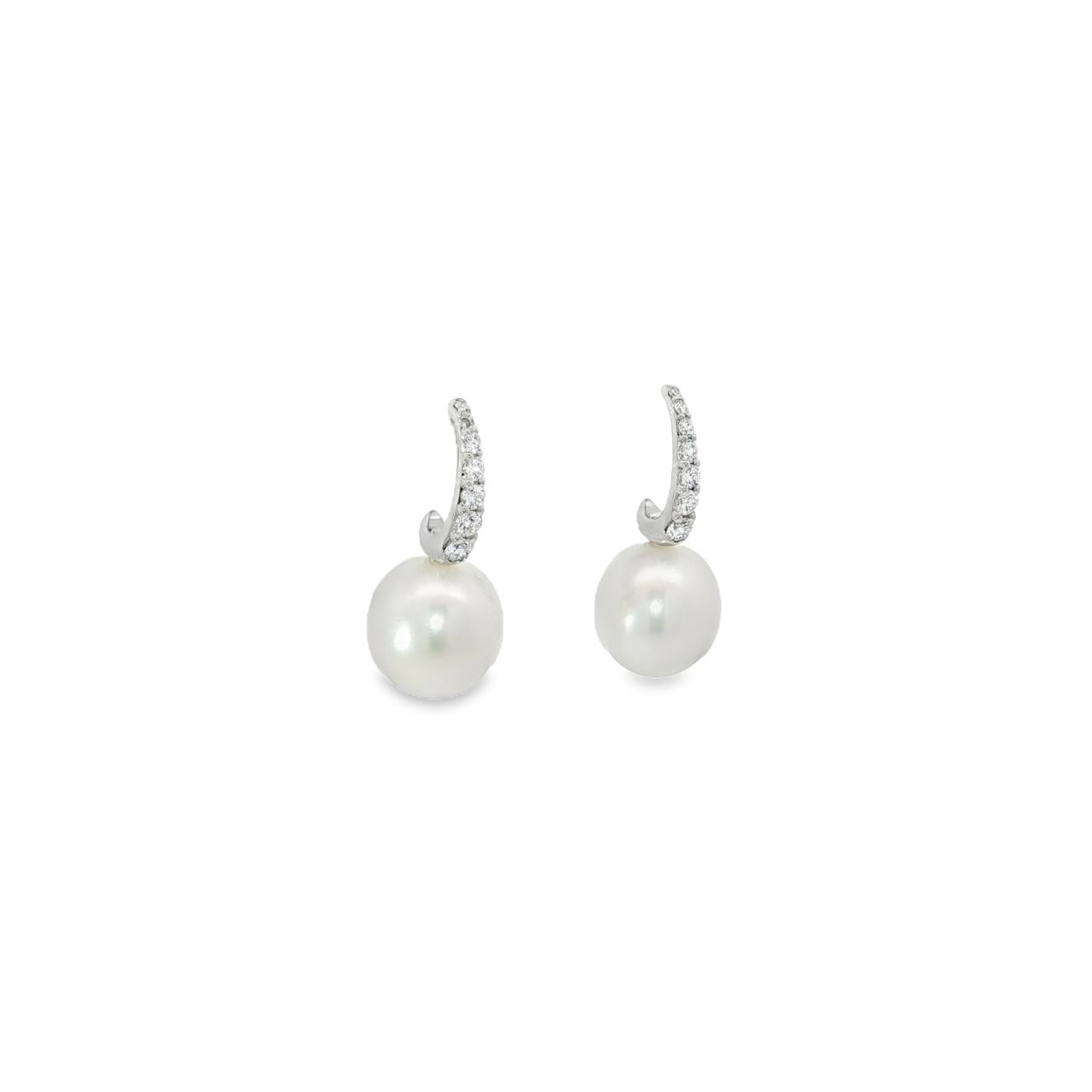 9ct white gold earrings with curved diamond-set front and 9mm South Sea pearl drops.