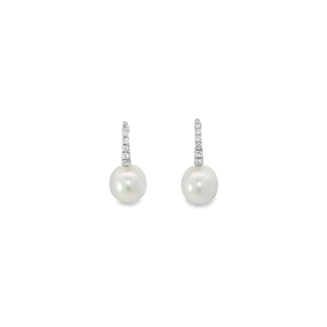 9ct white gold earrings with curved diamond-set front and 9mm South Sea pearl drops.