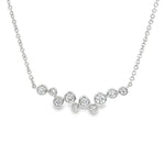 18ct white gold diamond necklet with bezel-set diamonds in a scattered bubble formation.