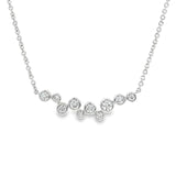 18ct white gold diamond necklet with bezel-set diamonds in a scattered bubble formation.