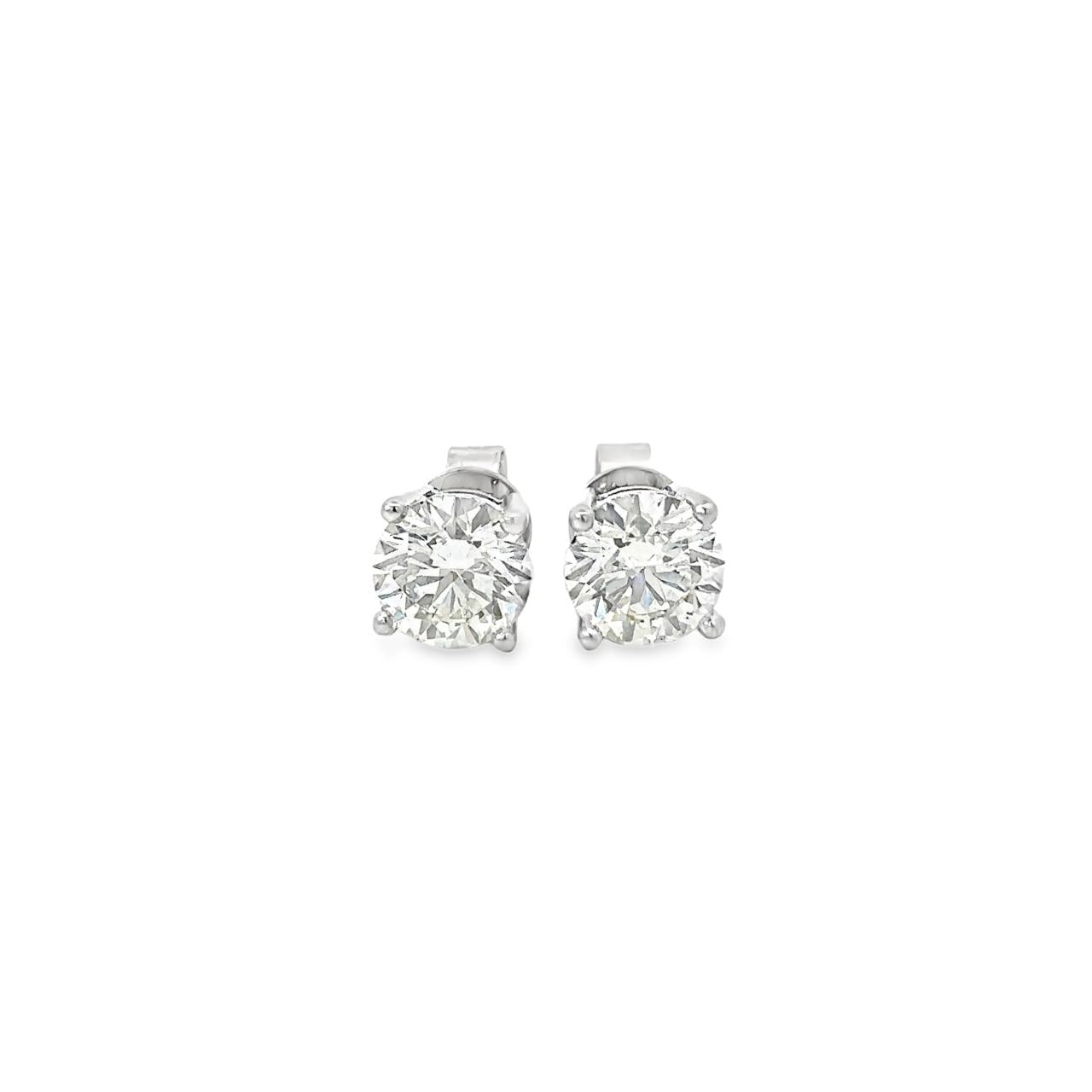 18ct white gold diamond stud earrings with round brilliant cut diamonds in four claw settings.