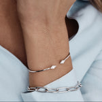 9ct white gold elongated oval paperclip link bracelet with parrot clasp.