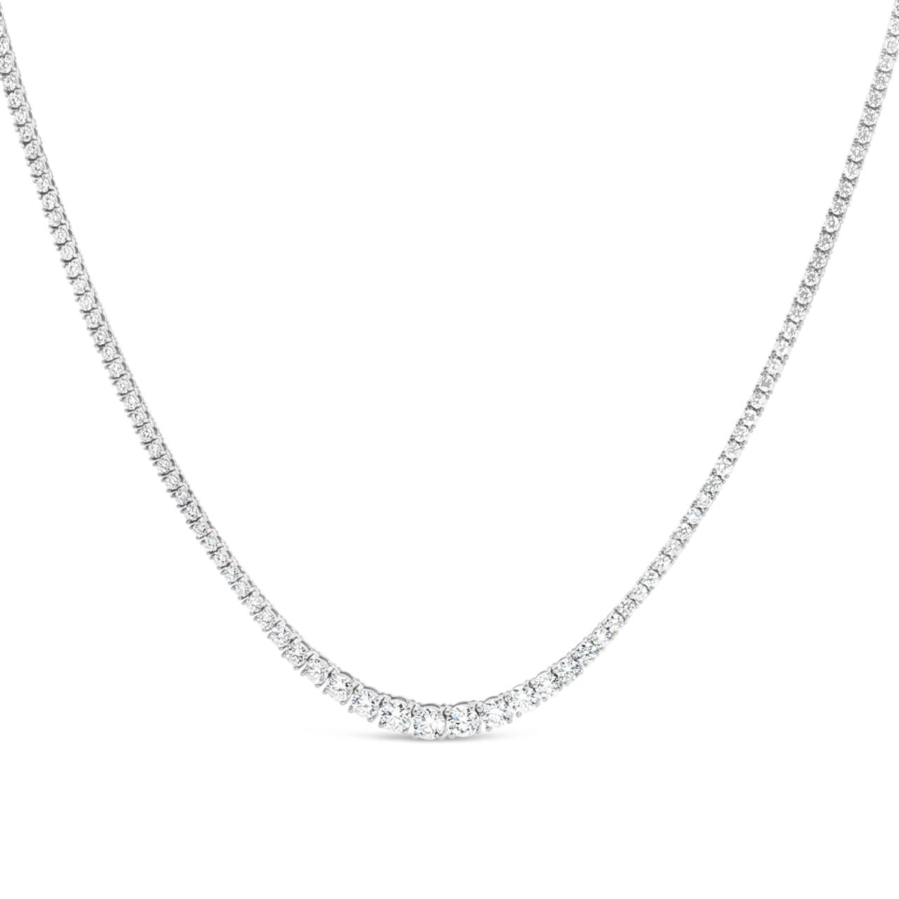 18ct white gold graduating diamond tennis necklet with four-claw settings.
