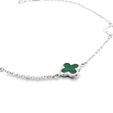 9ct white gold trace link bracelet with green clover charm and two open clover motifs.