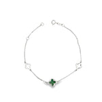 9ct white gold trace link bracelet with green clover charm and two open clover motifs.