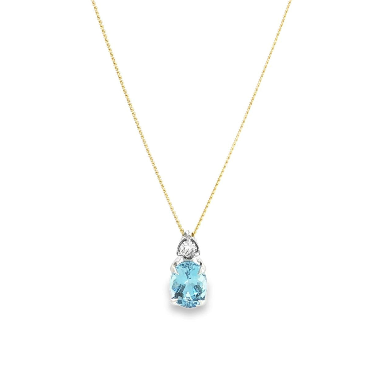 9ct white gold oval aquamarine and diamond pendant with triangular diamond accent.