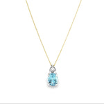 9ct white gold oval aquamarine and diamond pendant with triangular diamond accent.