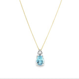 9ct white gold oval aquamarine and diamond pendant with triangular diamond accent.