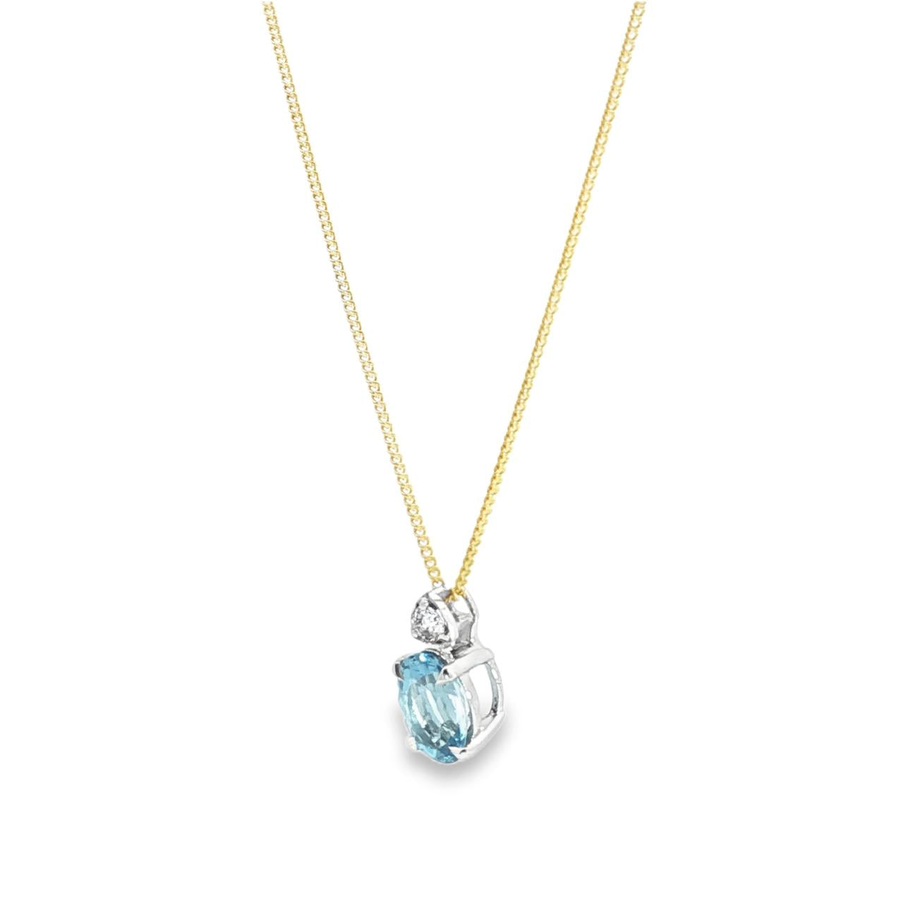 9ct white gold oval aquamarine and diamond pendant with triangular diamond accent.
