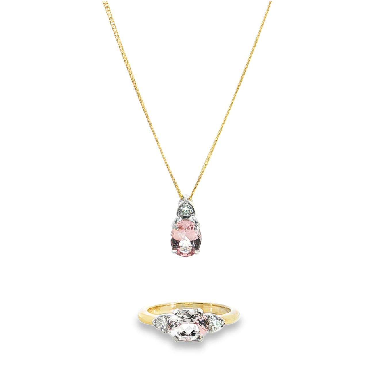 9ct white gold oval morganite and diamond pendant with triangular diamond detail.