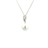 18ct white gold pendant with marquise diamond top, princess-cut sapphire, and 10mm South Sea pearl drop.