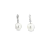 18ct white gold stud earrings with 9mm oval South Sea pearls and claw-set diamonds.