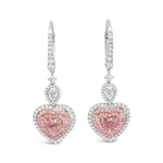 White and rose gold articulated heart-shaped diamond earrings with pink and white diamond triple halo design.