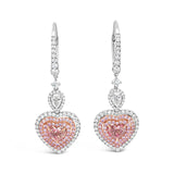 White and rose gold articulated heart-shaped diamond earrings with pink and white diamond triple halo design.